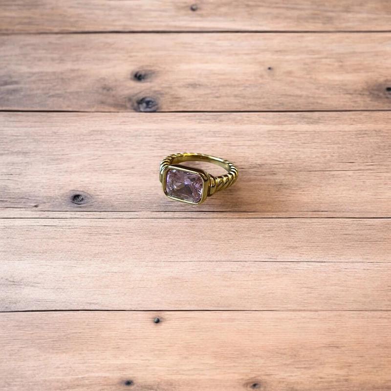 Lovely vintage style gold ring with pink gemstone. All sizes.