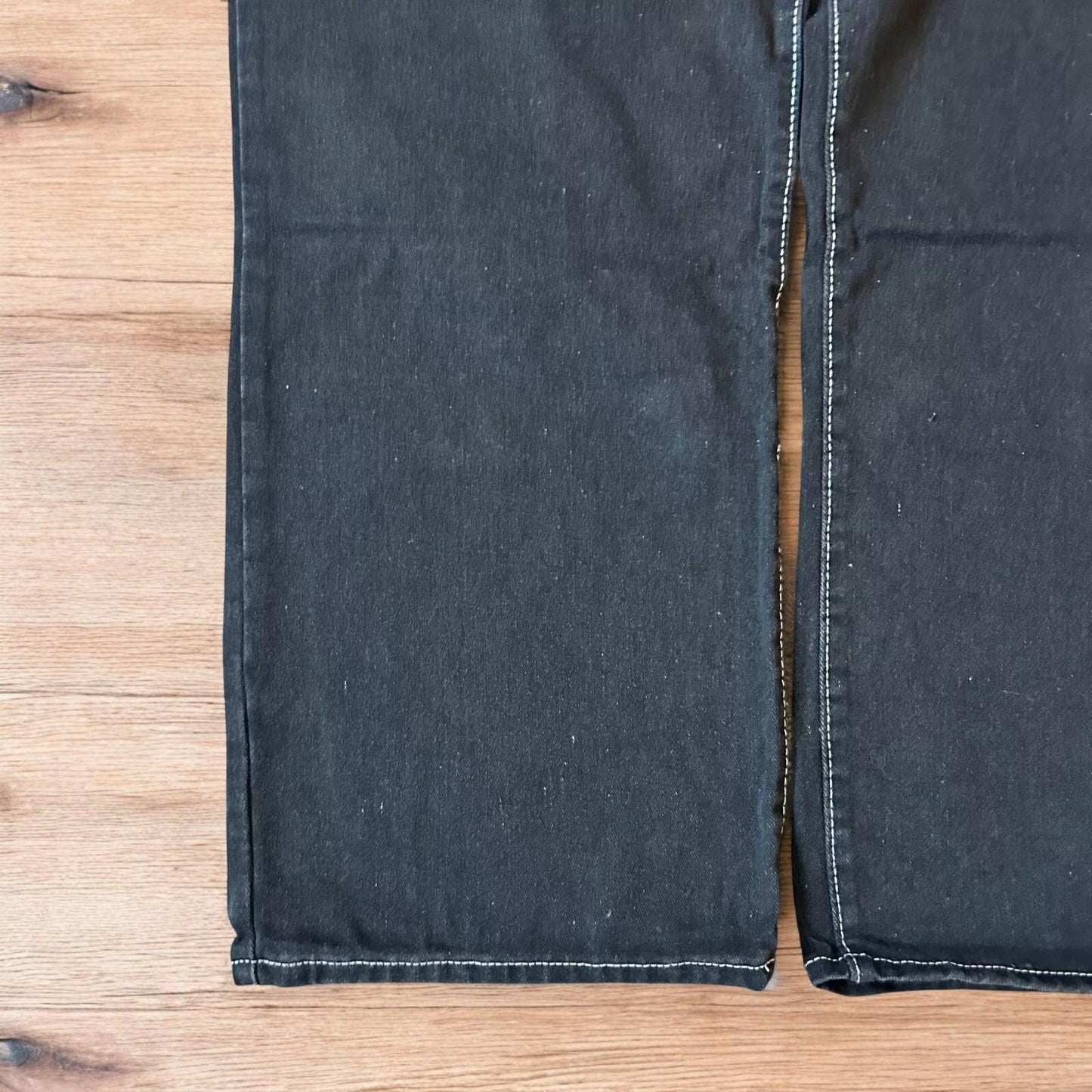 Insane baggy relaxed fit jeans in washed black with embroidery.