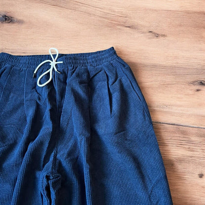 Super baggy wide leg skater corduroy trousers in navy blue.