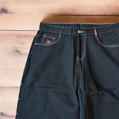 Insane baggy relaxed fit jeans washed black with red embroidery.