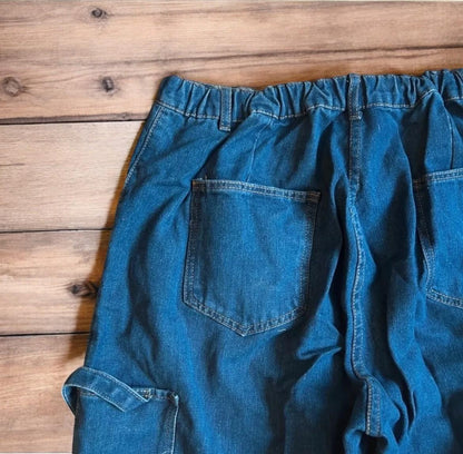 Vintage style baggy wide leg skater fit jeans in washed mid blue.
