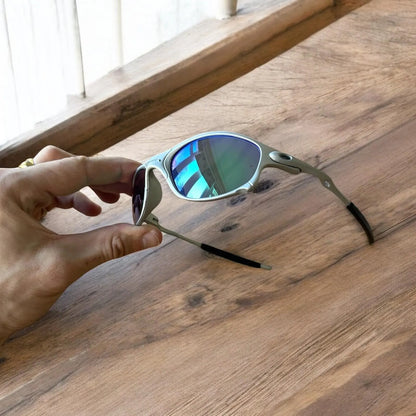 Insane metal frame sunglasses in silver with blue lense. One size.