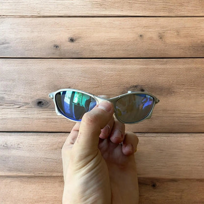 Insane metal frame sunglasses in silver with blue lense. One size.