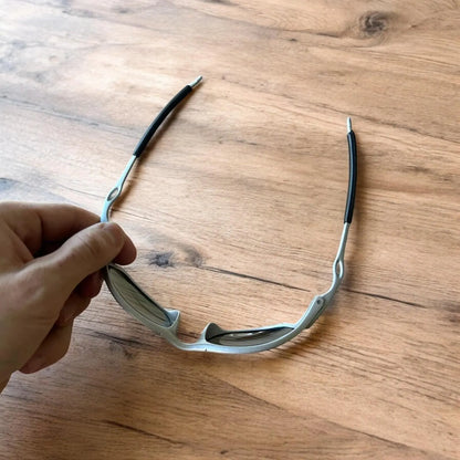 Insane metal frame sunglasses in silver with blue lense. One size.