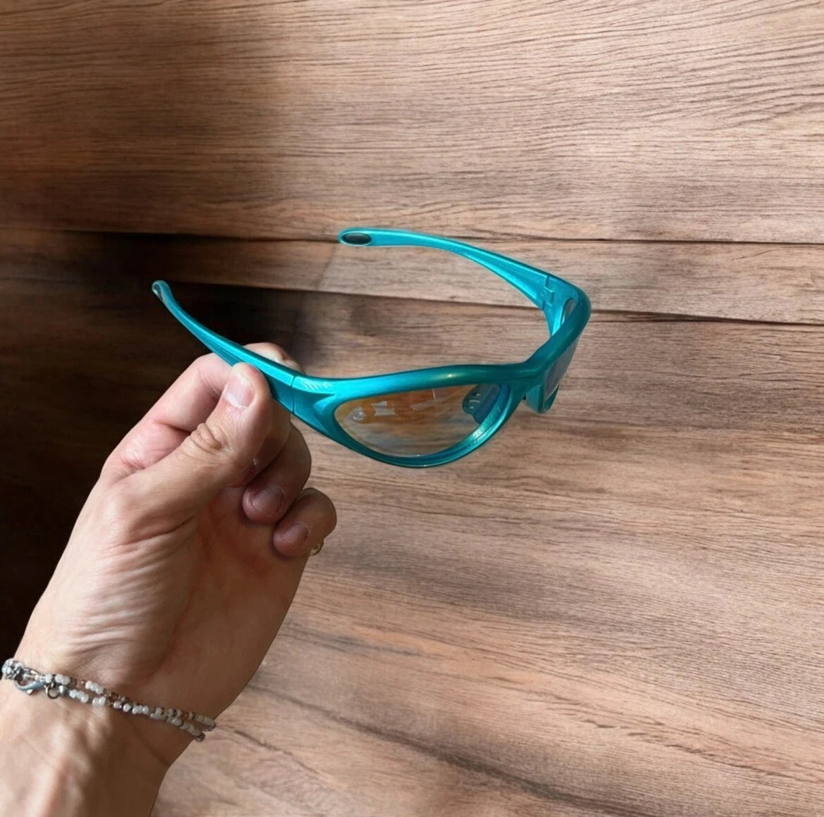 Cool Y2k wrap around skiing cycling sunglasses in blue. One size.