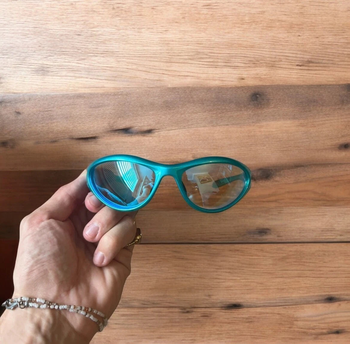 Cool Y2k wrap around skiing cycling sunglasses in blue. One size.