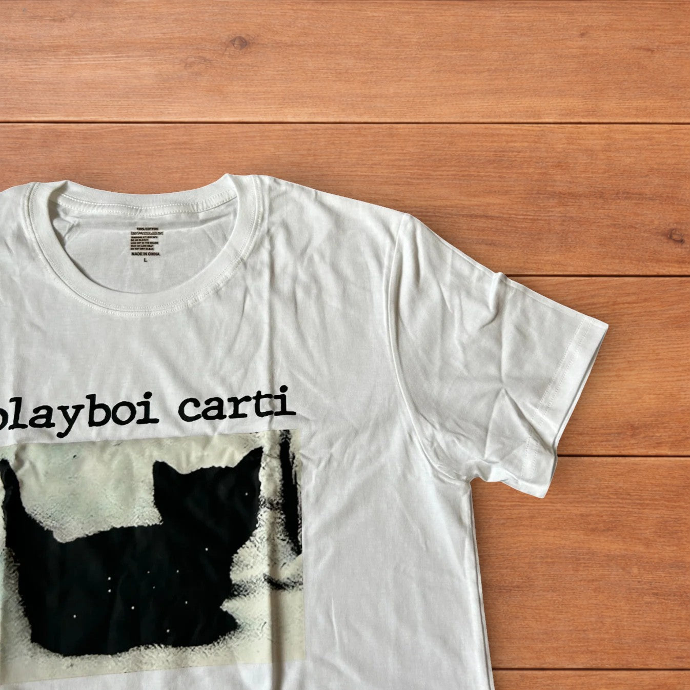 Cool Playboi Carti tshirt in white with front graphic print.