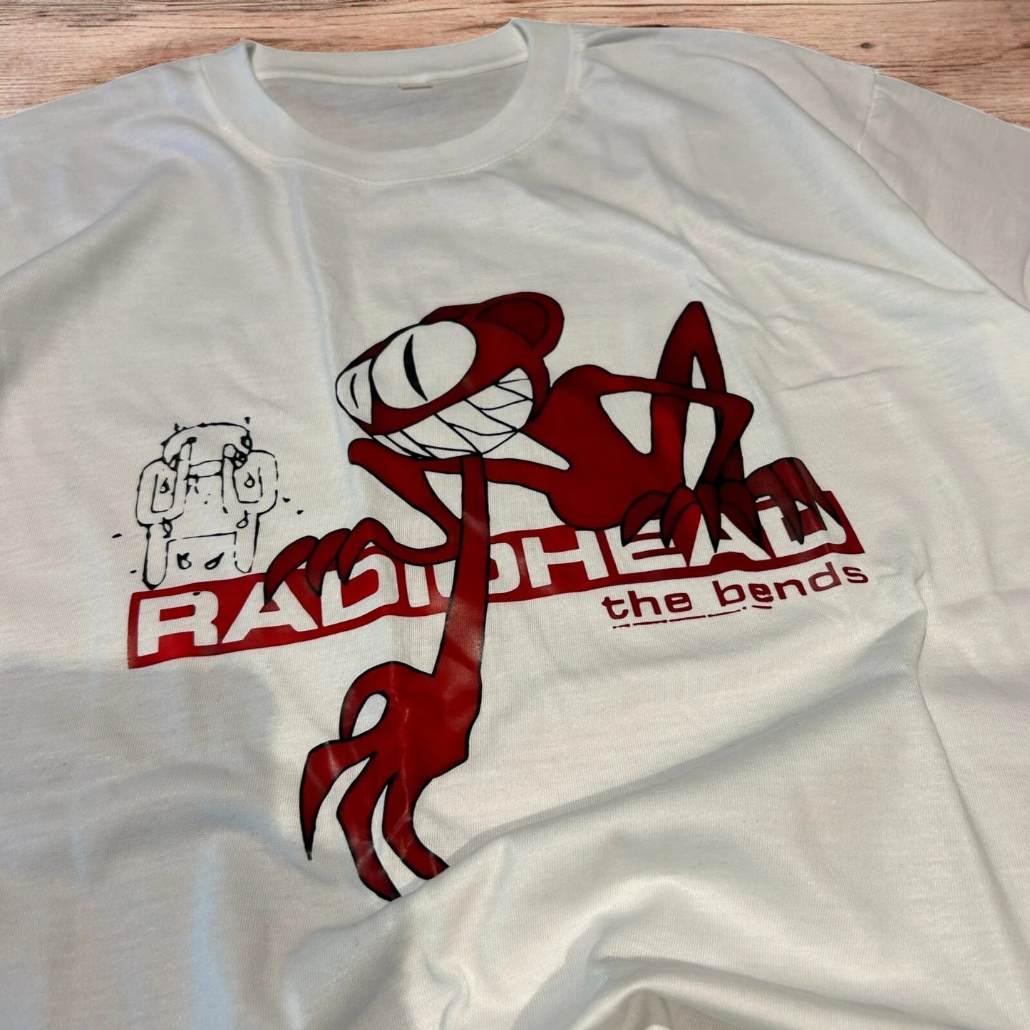 Radiohead the bends T-shirt with front graphic in white.