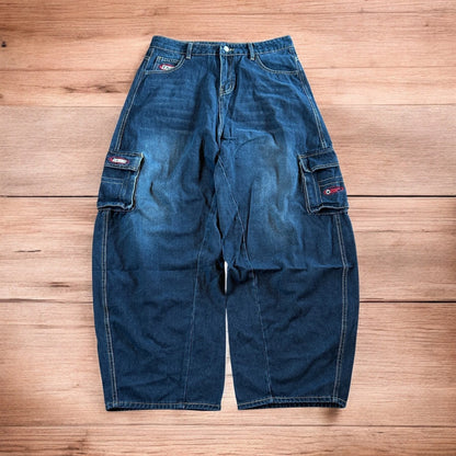 Vintage style baggy wide leg skater fit cargo jeans with embroidery in mid blue.